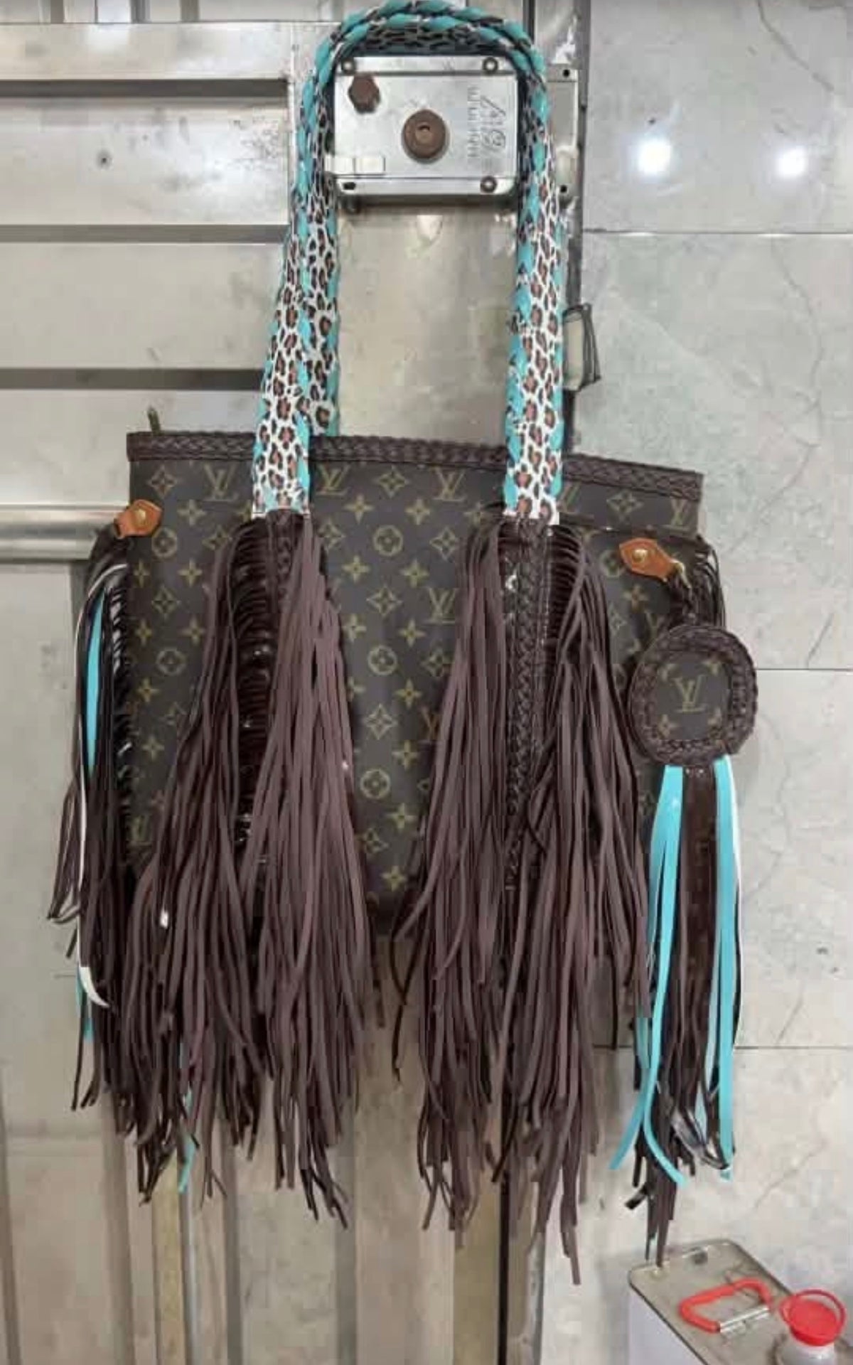 lv-teal-fringe-purse